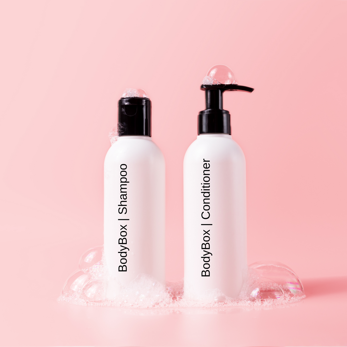 Two BodyBox bottles of one shampoo and one conditioner.